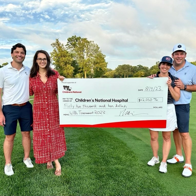 Will's Charity Golf Tournament presenting a check to Children's National