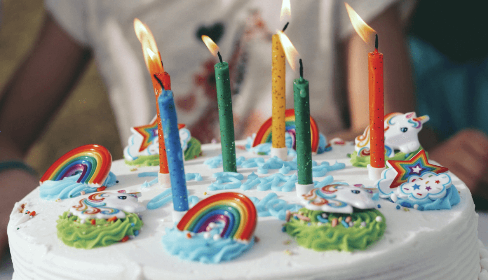 Birthday cake with lit candles